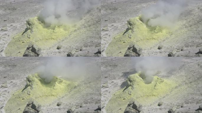 在门捷列夫火山斜坡上的一个喷气孔里冒烟的硫磺