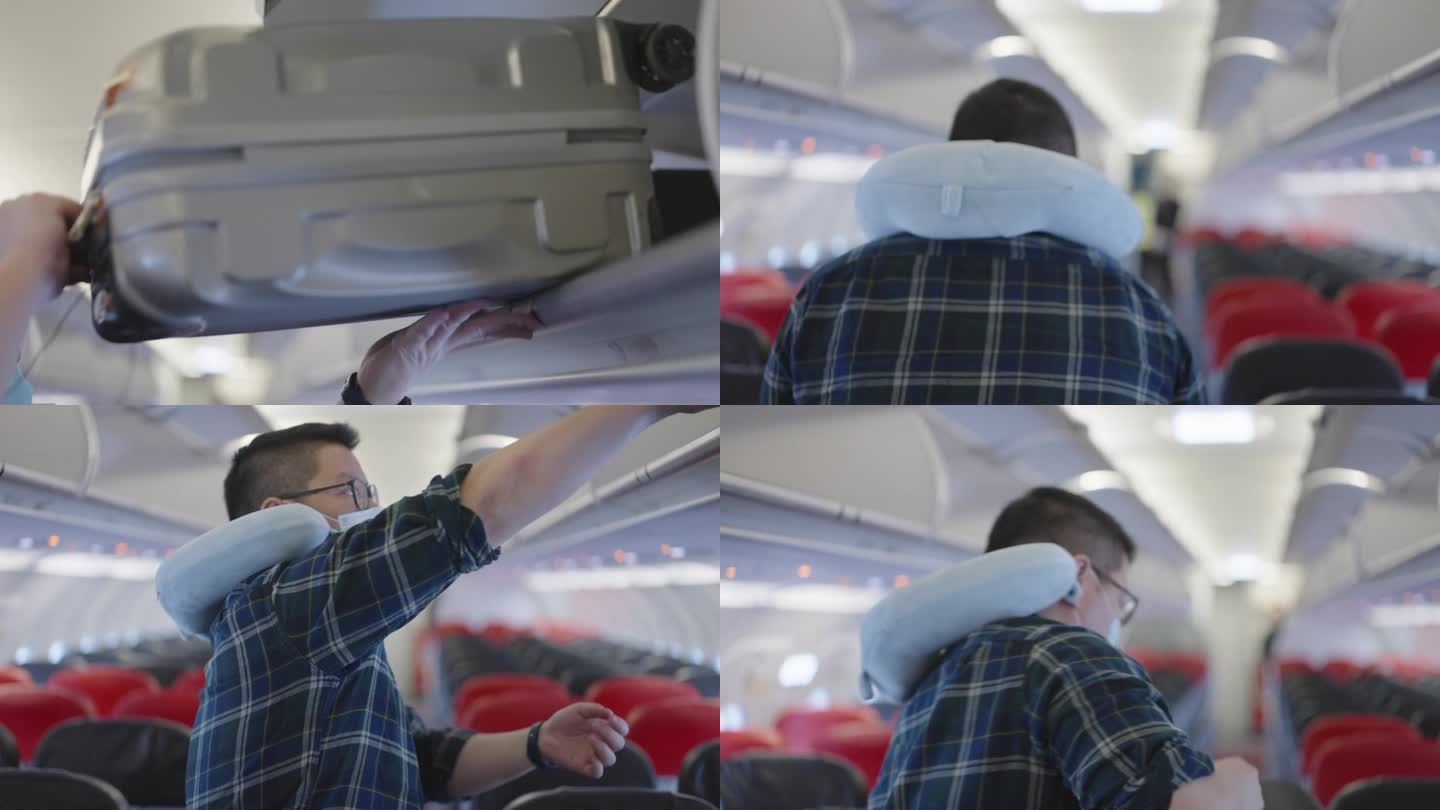 亚洲旅客在飞机上的头顶行李架上拿行李