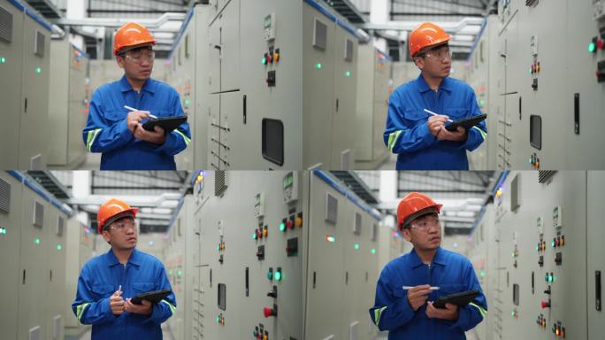 电气工程师在工厂的控制室里努力工作。利用数字平板电脑，利用Wi-Fi技术的力量。专业检查和监控电气系