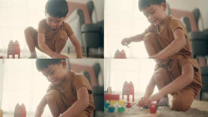 捕捉快乐:亚洲父子在家快乐玩耍的积极情绪。