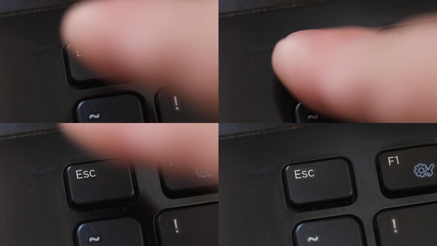 手指按下笔记本电脑键盘上的esc键