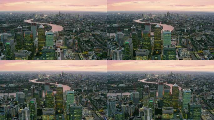 鸟瞰金丝雀码头的天际线。拥有现代摩天大楼的伦敦金融区。泰晤士河，著名的桥梁和建筑的背景。英格兰。英国