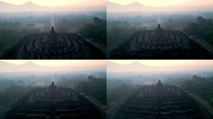 婆罗浮屠寺以日出和雾为背景。鸟瞰图。印尼爪哇