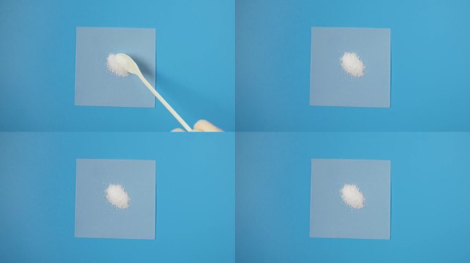 用测量勺将一水葡萄糖粉末、d-葡萄糖或葡萄糖的样品放在纸上。天然甜味剂，代糖