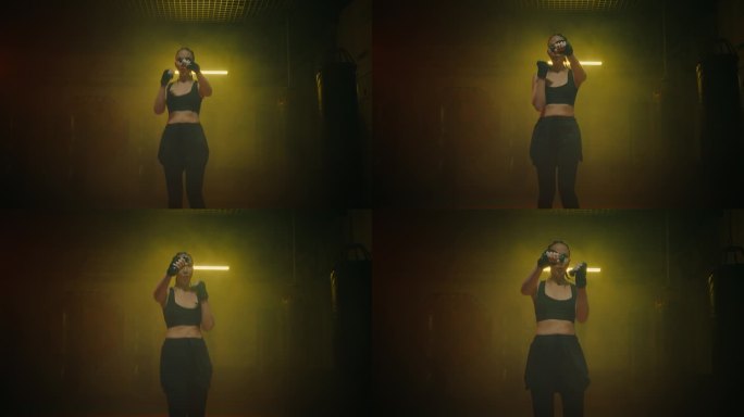 女运动员晚上在现代健身房训练，与女运动员的电影中景拍摄，4K, Prores