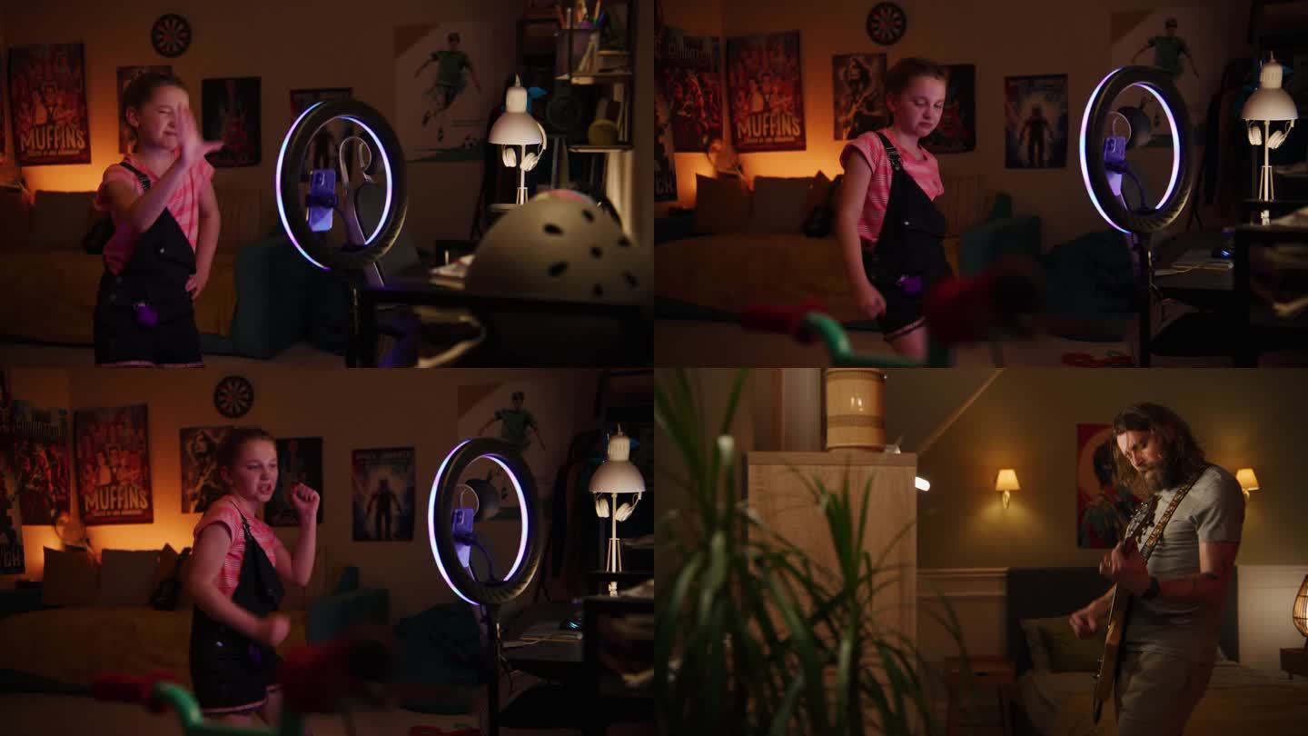 男子在卧室里弹电吉他。镜头移到录制舞蹈视频的年轻女孩