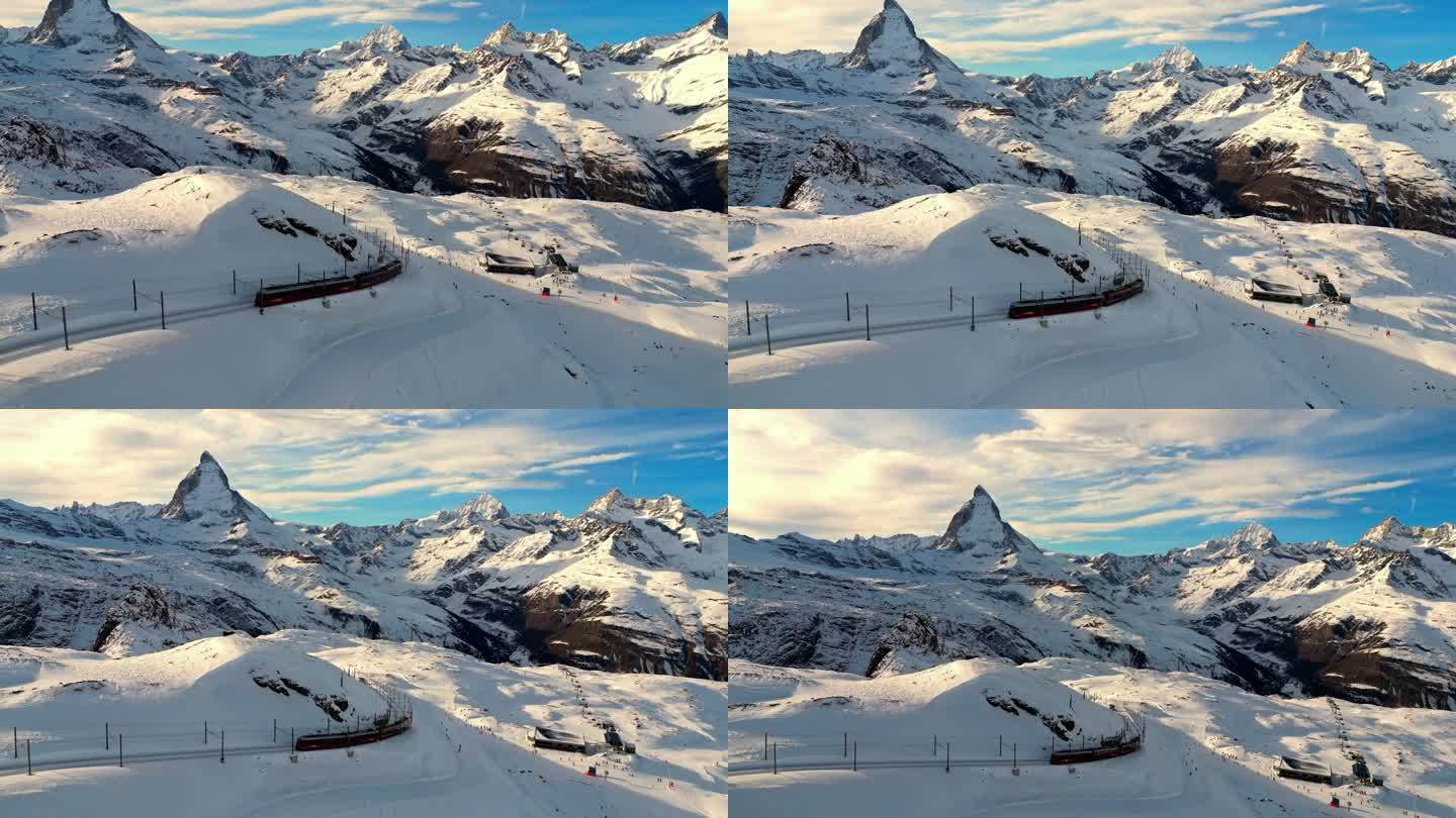 瑞士阿尔卑斯山上著名的冰川列车，日落时分的马特洪峰
