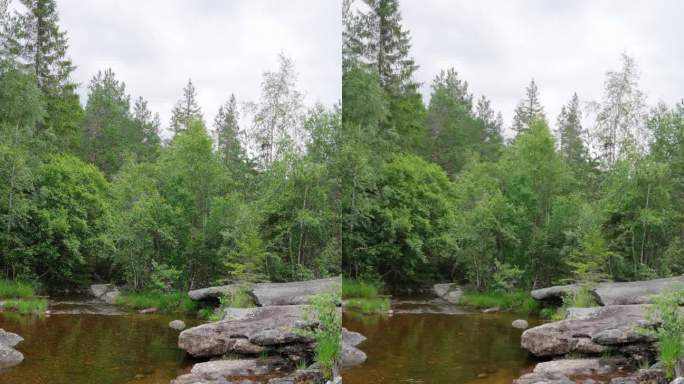 垂直视频4k PRORES HQ。挪威美丽的自然景观，有一条小溪和小瀑布