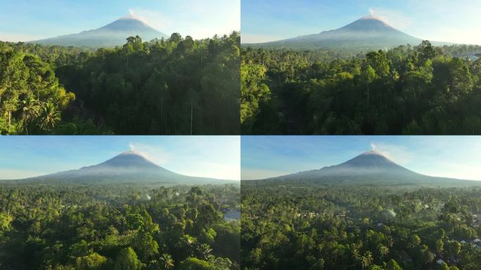 风景秀丽的鸟瞰图日出的图姆帕克塞乌瀑布与塞默鲁火山背景丛林在爪哇岛，印度尼西亚