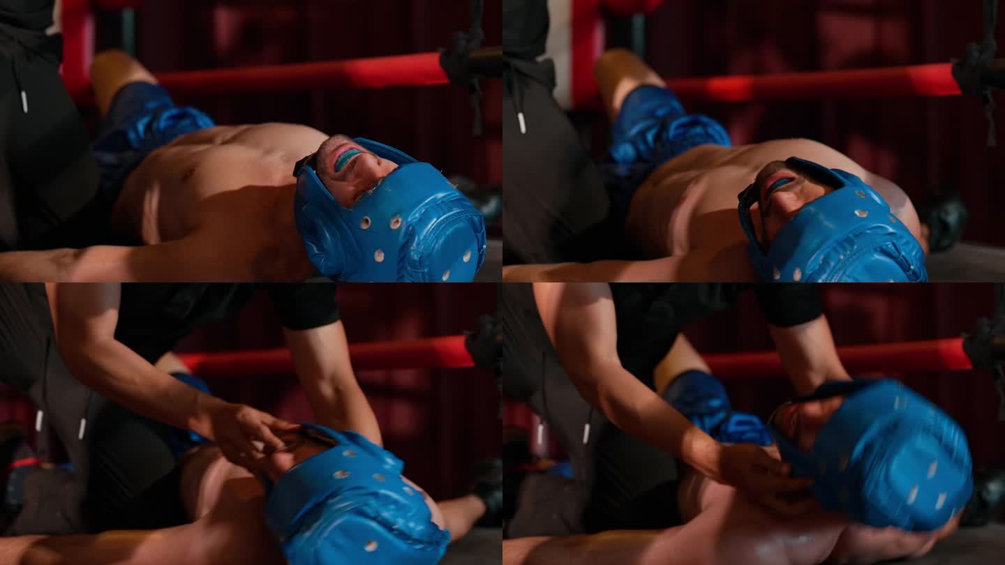 一名年轻的白人成年拳击手被非洲拳击手击倒后躺在拳击台上的特写镜头。