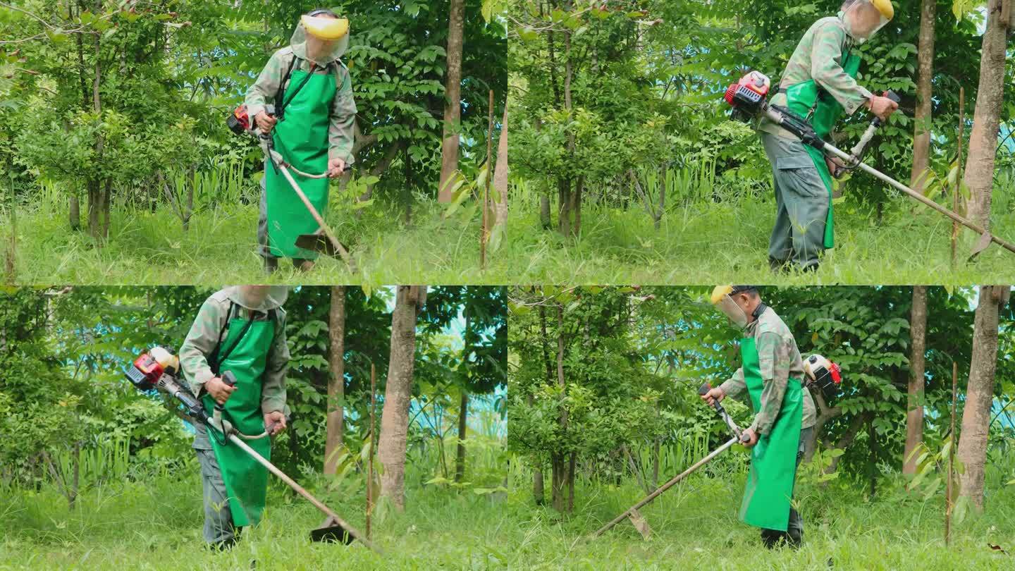 一位亚洲老人在后院割草