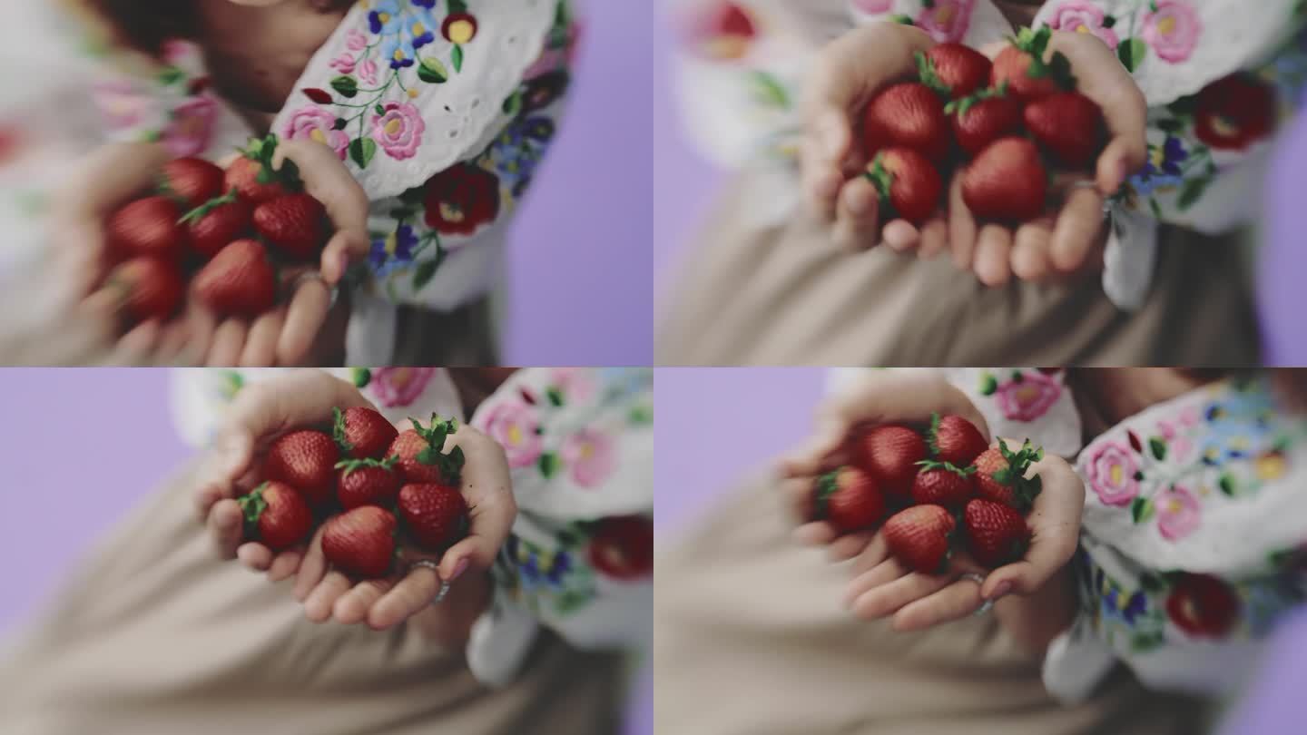 手上有草莓草莓采摘新鲜水果绿色