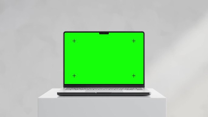 现代笔记本电脑模型，绿色屏幕，极简主义的设置，坐在一个白色的底座上，镜头中的小车