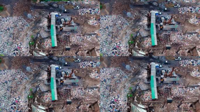 鸟瞰图:垃圾焚烧填埋场，地球污染。无人机展示了垃圾焚烧的严重性，强调了其在地球污染中的作用，并敦促可