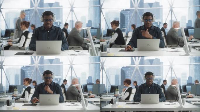 在市中心摩天大楼的办公室里，一个成功的黑人戴上耳机，开始在笔记本电脑上打字。在多元化科技创业公司从事