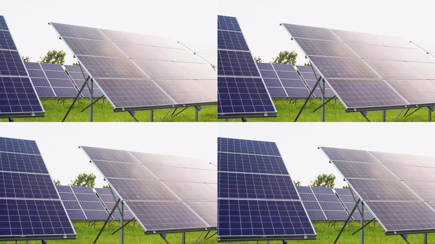 天空背景上的太阳能电池板。太阳能发电厂。蓝色太阳能电池板。电力的替代来源。太阳能农场