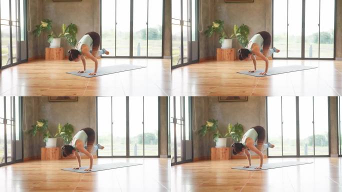 东南亚人练习瑜伽，在家健身