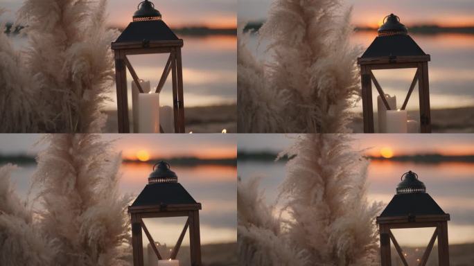 浪漫的复古装饰和蜡烛在沙滩上日落，婚礼或约会在湖岸