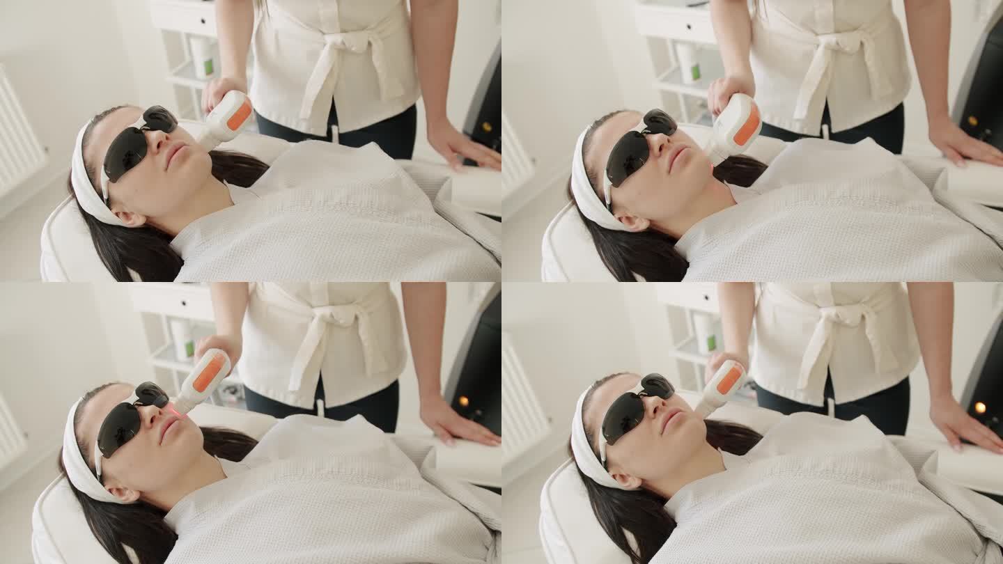 女子在美容诊所接受液化石油气硬件按摩。
