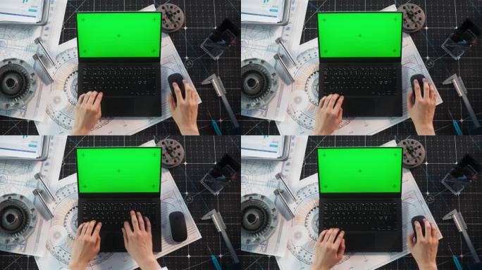 匿名工程师在笔记本电脑上打字，模拟绿屏Chromakey显示与运动跟踪占位符。科学家通过电子邮件与工