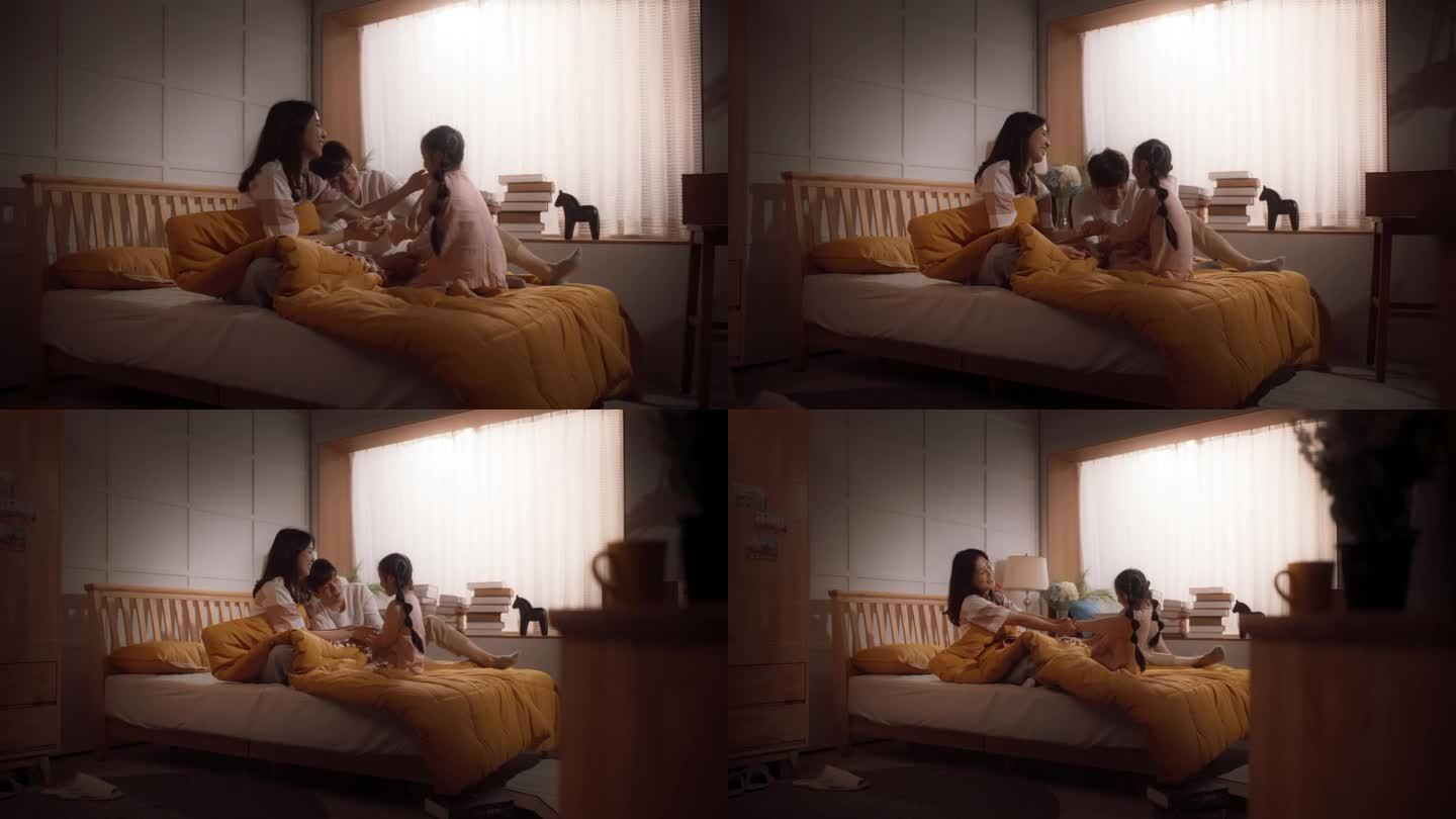 活泼好动的孩子叫醒她的父母，迎接新的一天。韩国家庭准备迎接快乐的一天，兴奋的小女孩强迫父母下床开始准