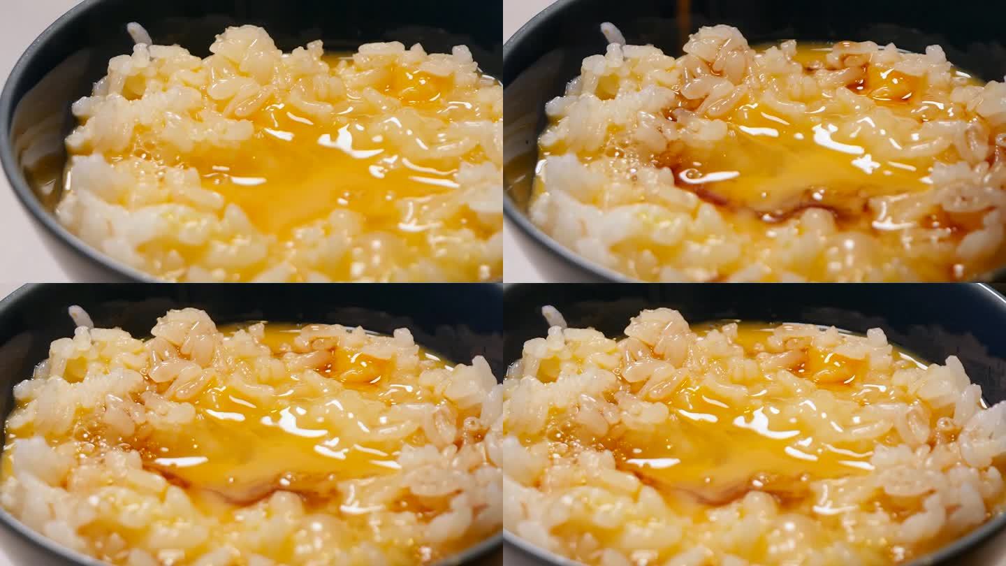 一个把酱油涂在生鸡蛋和米饭上的视频。从左到右。