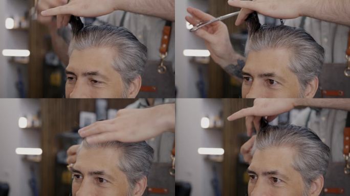 成熟男人在理发店理发的特写，关心美容和时尚