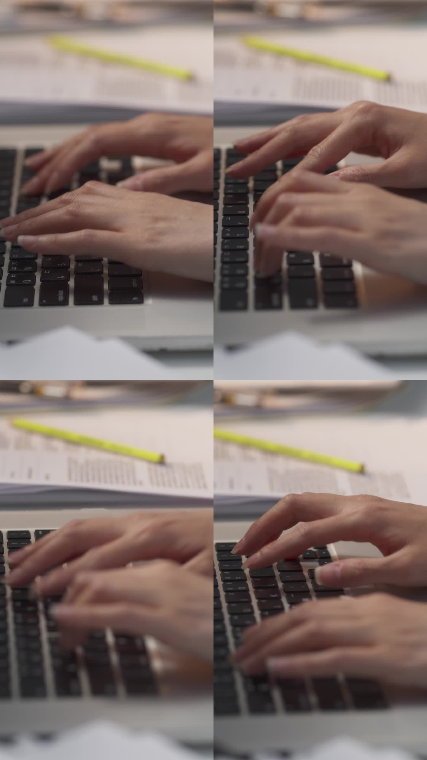 垂直屏幕:项目经理的手专注于笔记本电脑键盘的特写镜头。管理，组织和处理关键文件和远程工作流程的通信