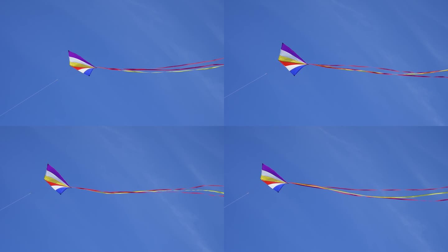 彩色风筝在柔软多云的天空中飞翔。开场视频素材