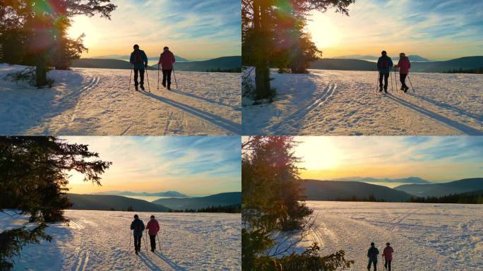 两个年长的徒步旅行者在雪地里走在乡下的某个地方。