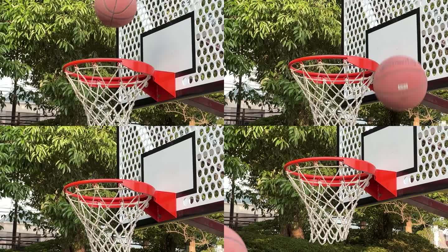 篮球慢镜头中的一个投篮不中:球从篮筐上弹了出来