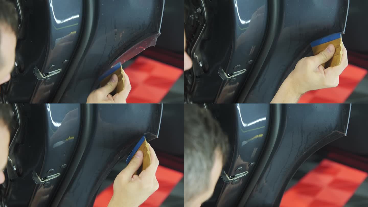 将PPF保护膜涂在汽车上的过程。在车门上涂保护膜的工人。广角镜头