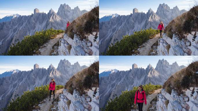 爱冒险的女人探索自然，在风景如画的山区徒步旅行