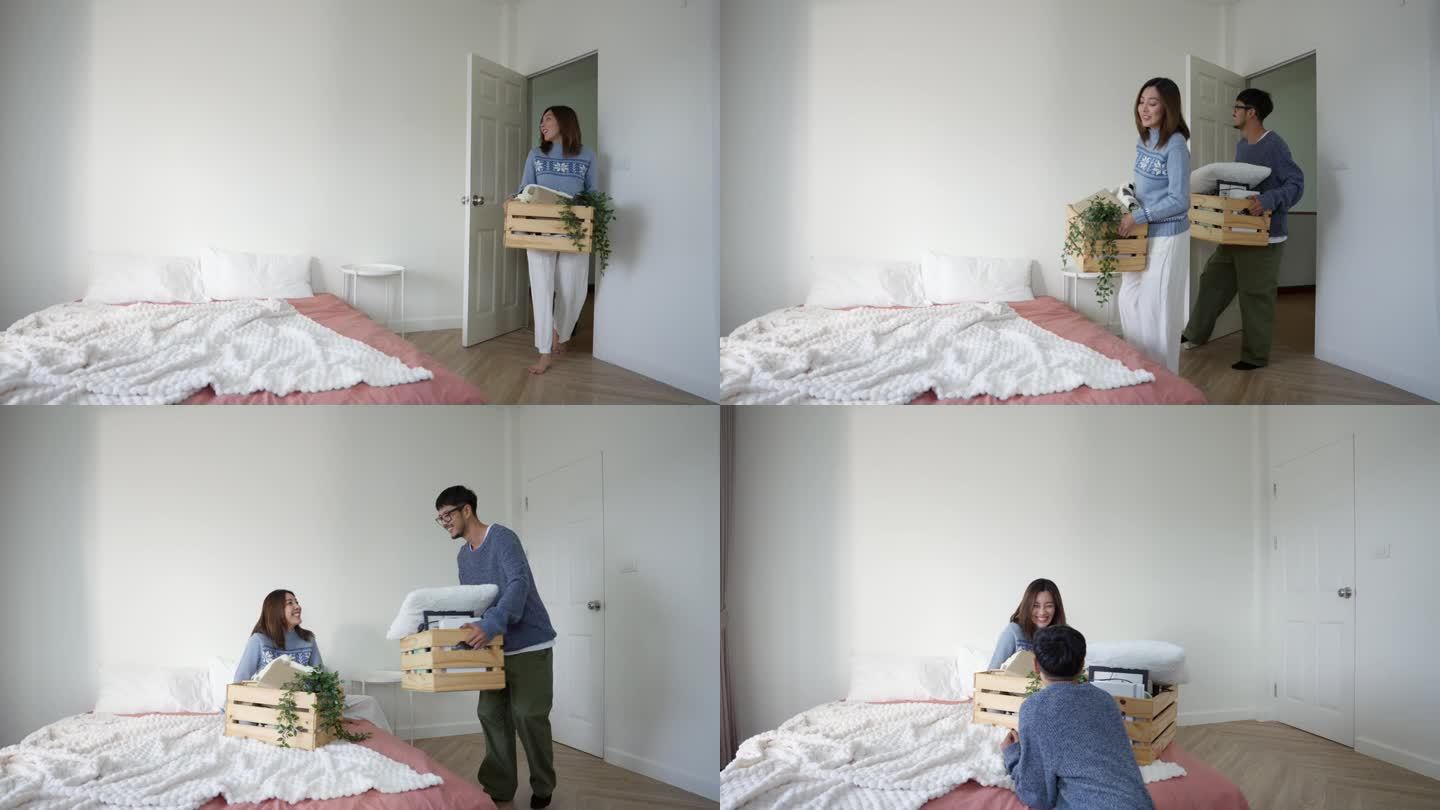 一对亚洲夫妇搬进新家。