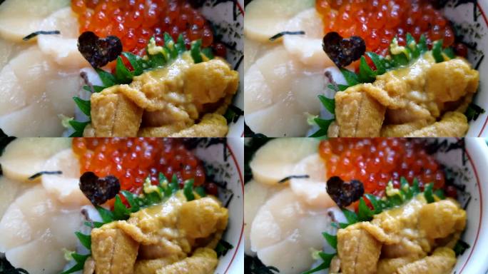 北海道生海鲜米饭配以扇贝、海胆和三文鱼籽热uni ikura 4k