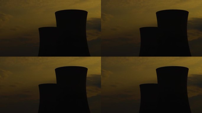 在天黑之前，不活跃的核冷却塔的剪影