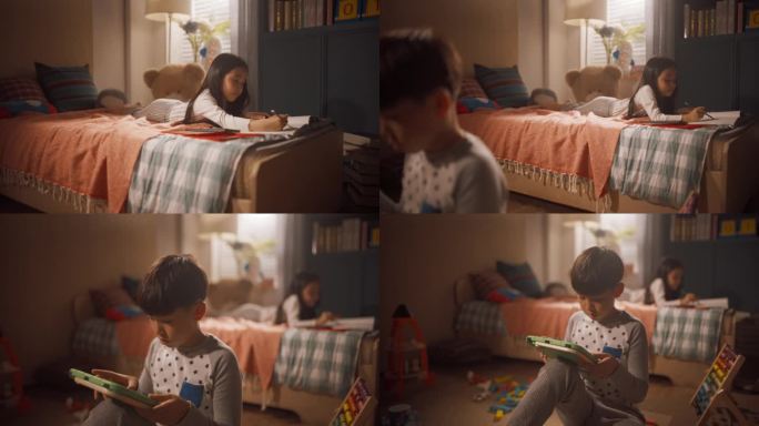 年轻的韩国男孩和女孩在儿童室玩玩具。小妹妹用彩色铅笔在笔记本上画画，小男孩学习使用平板电脑和玩教育游