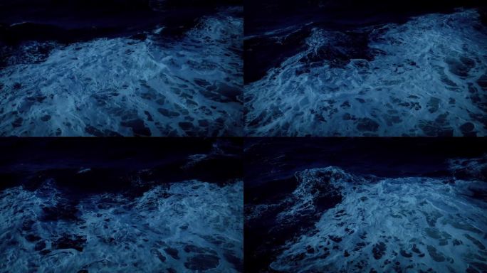 黑暗中船侧的波浪航拍海水海风海浪