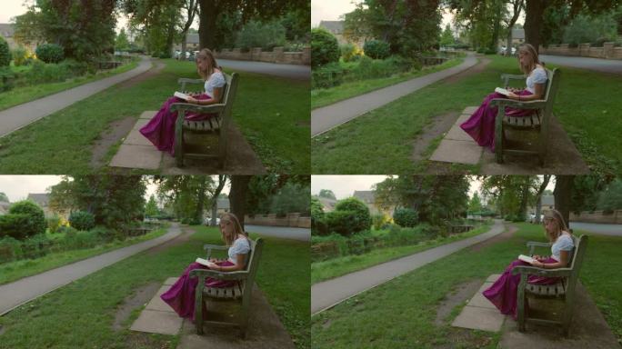 一个十几岁的女孩喜欢在公园里看书
