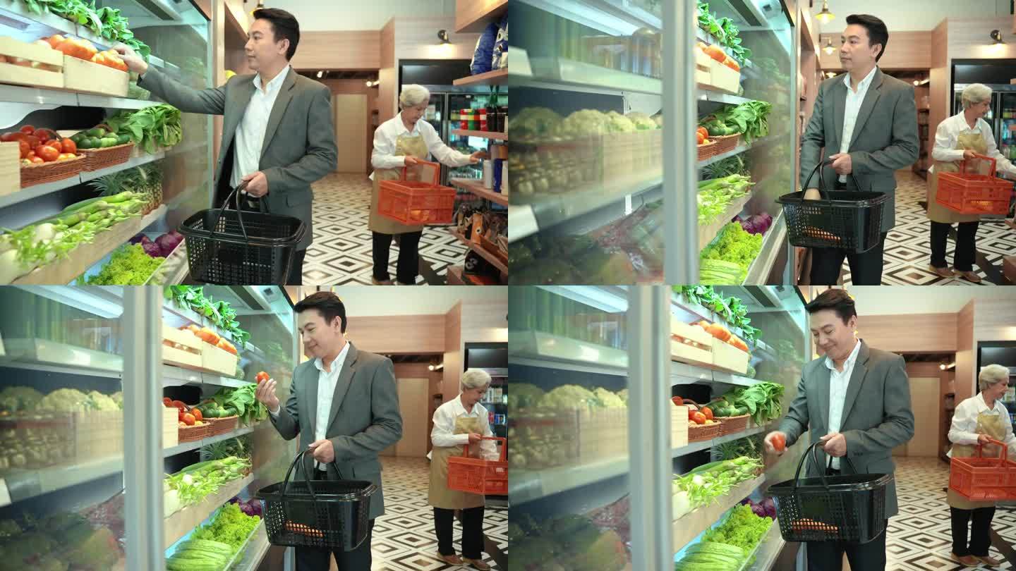 有魅力的商人站在超市的货架前挑选蔬菜和日用品。残疾超市。