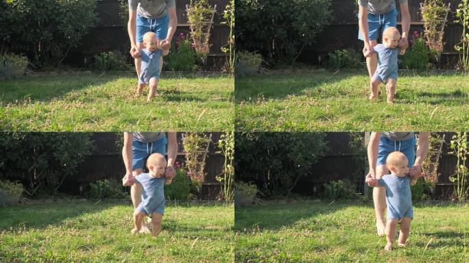 婴儿在草地上迈出第一步。爸爸和儿子在大自然中散步，孩子的梦想概念。宝宝跟着妈妈迈出第一步。妈妈和小儿