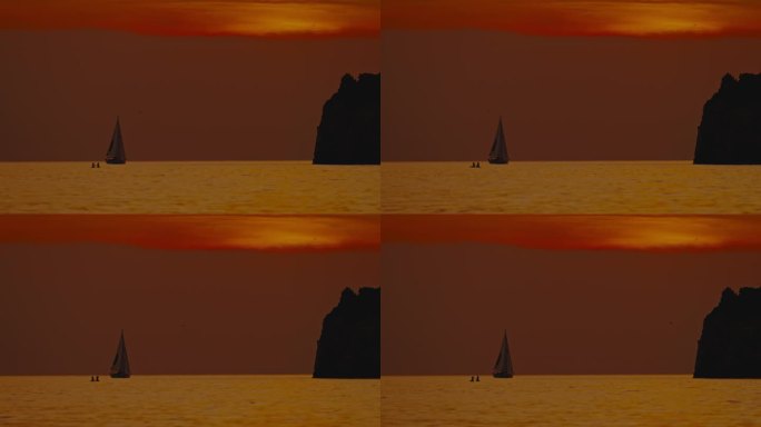 日落时分，游客在海上玩桨板