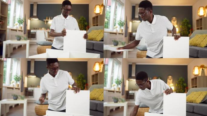 一个非洲裔美国人在公寓里组装新家具