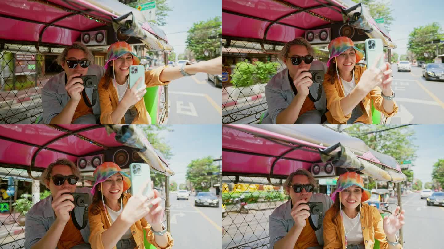 一对游客夫妇在曼谷捕捉瞬间。