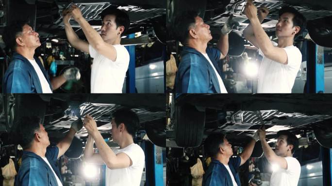 老年机械教学人员在车库维修汽车悬架。