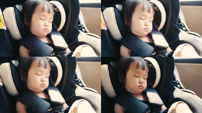 家庭度假时，一个亚洲小孩坐在汽车座椅上休息