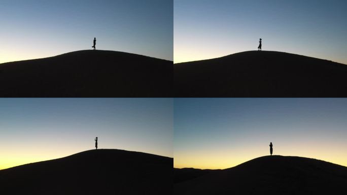 4K原素材-航拍腾格里沙漠中的女孩