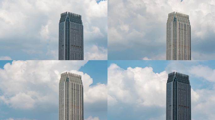 城市里一栋现代建筑物高楼蓝天白云延时摄影