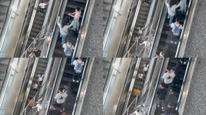 俯视高铁火车站上下扶梯人流