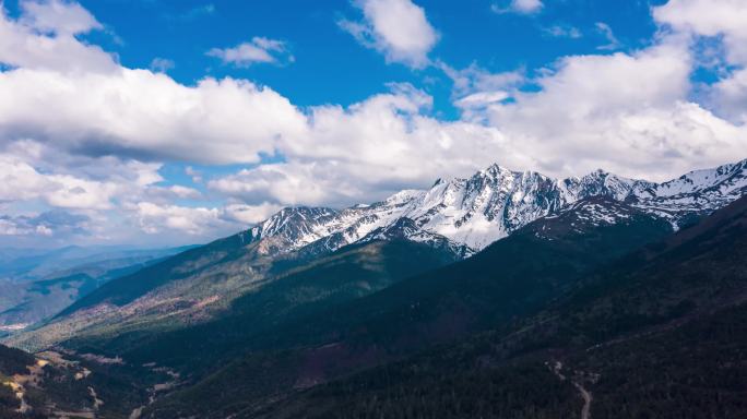 4K航拍延时云南迪庆蓝天白云白马雪山